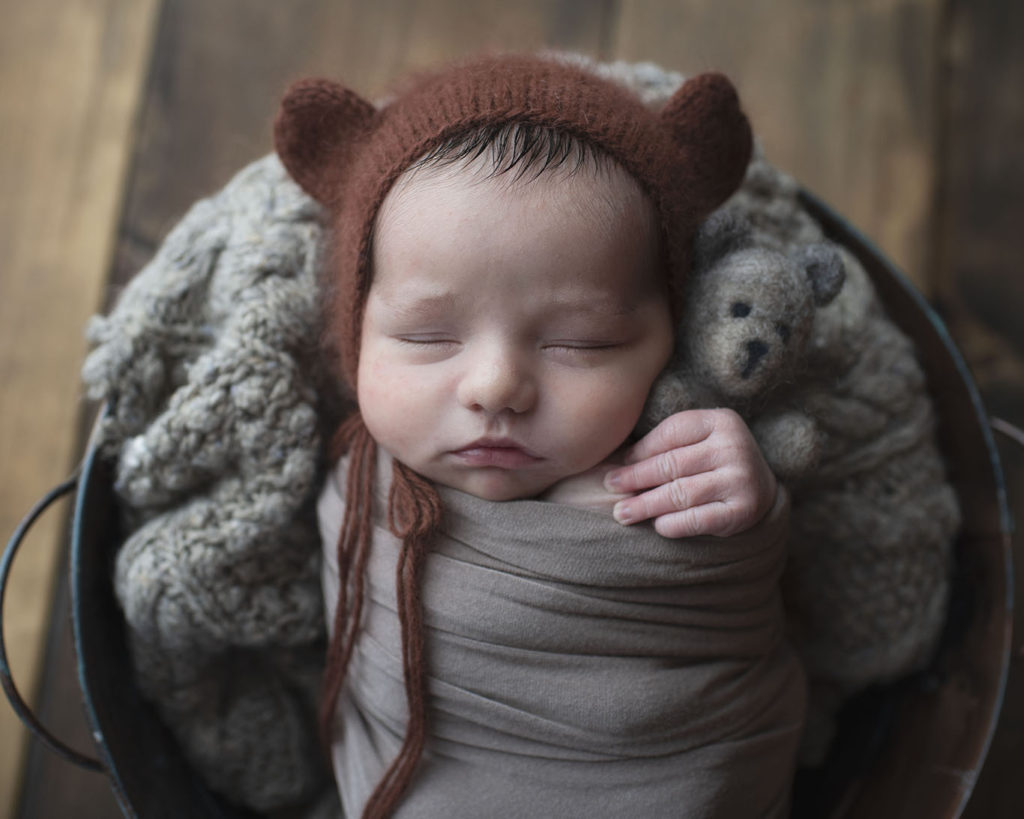 baby with bear hat bear prop newborn photography studio hershey pa dauphin county