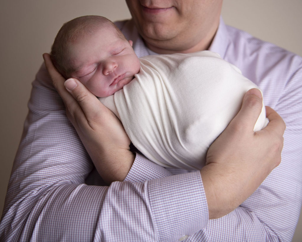 swaddled baby boy with daddy