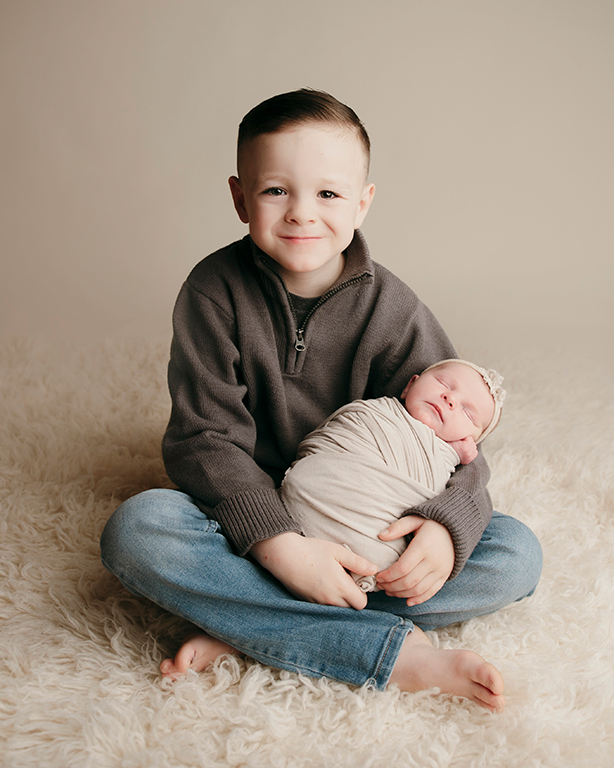 big brother and baby sister
kcb photography studio hershey pa pennsylvania
newborn photographs newborn photoshoot 